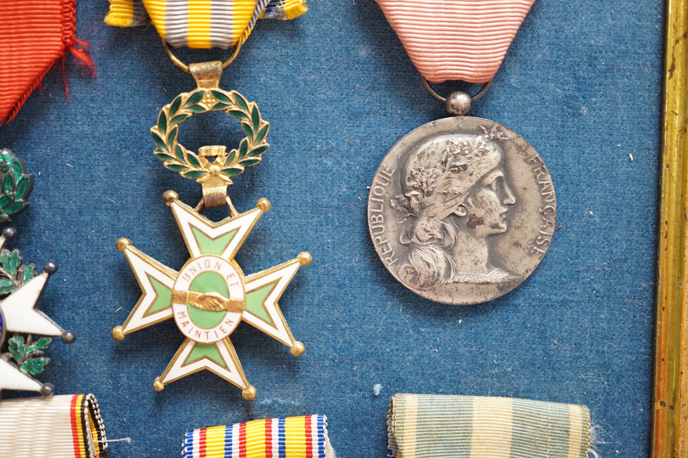 Eighteen French medals, including The War Cross, TOE French Legion Cross, Medal of Honour, Croix du Combatant Medal, WWI Commemorative Medal, 1870 Military Medal, 1914-18 Victory Medal, etc.